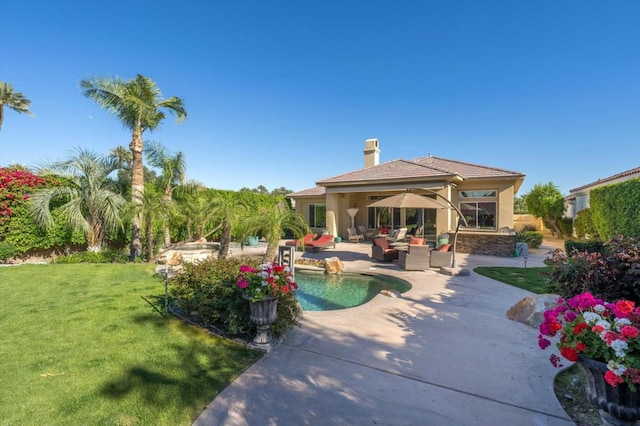 view of pool featuring an outdoor hangout area, a patio, and a lawn