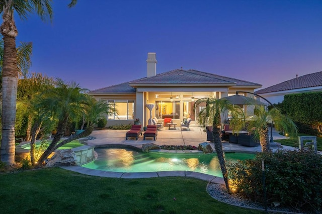 exterior space with outdoor lounge area, a yard, and a patio