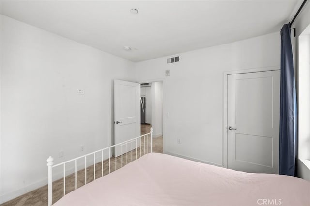 bedroom featuring carpet flooring