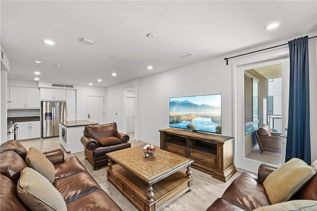 living room featuring light wood-type flooring