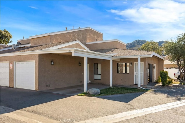 view of front of house featuring a mountain view