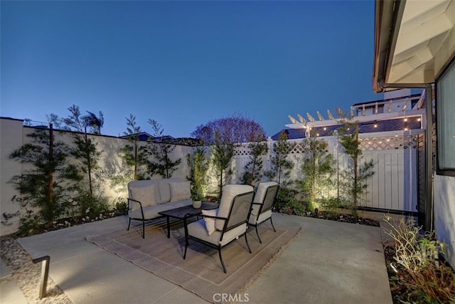 view of patio / terrace featuring a fenced backyard and an outdoor living space