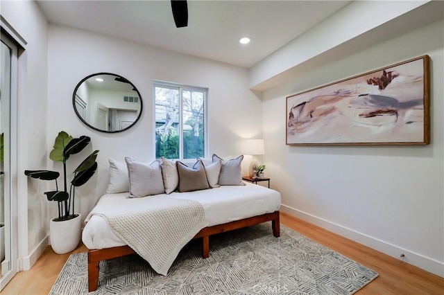 sitting room featuring light hardwood / wood-style floors