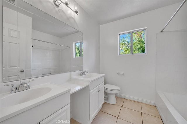 full bathroom with tile patterned flooring, vanity, bathtub / shower combination, and toilet