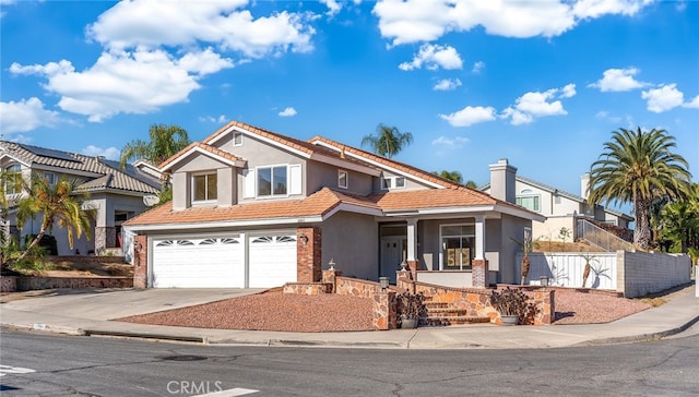 view of front of property featuring a garage