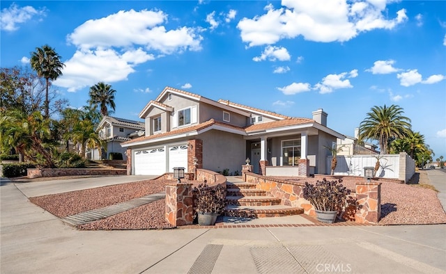 view of front of property with a garage