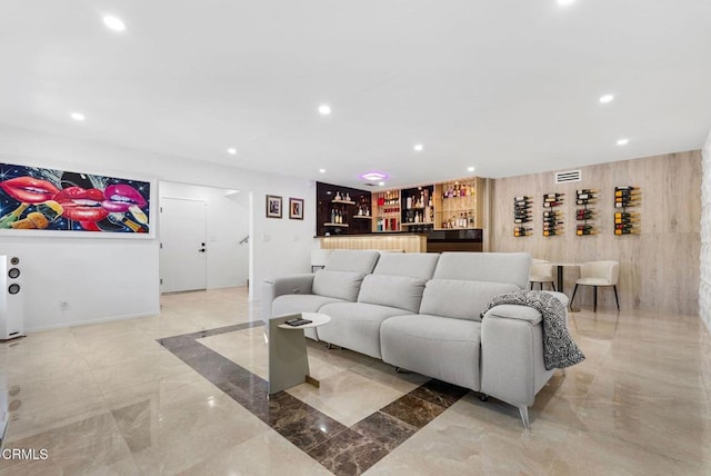 living room featuring indoor bar