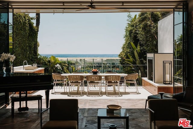 view of patio / terrace with a water view