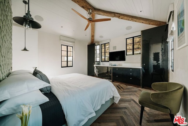 bedroom featuring dark parquet flooring and vaulted ceiling with beams