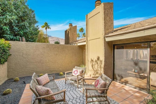 view of patio with a mountain view