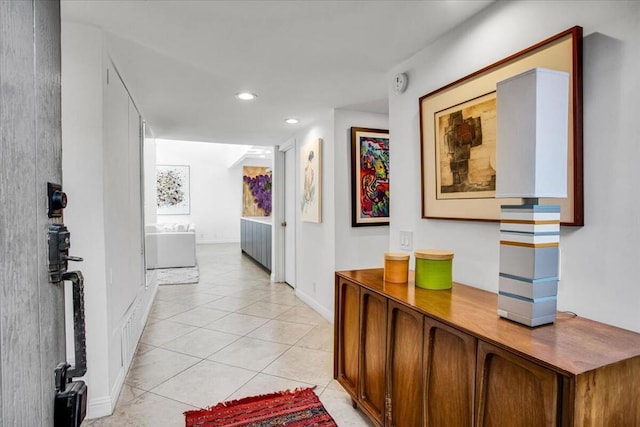 hallway with light tile patterned floors