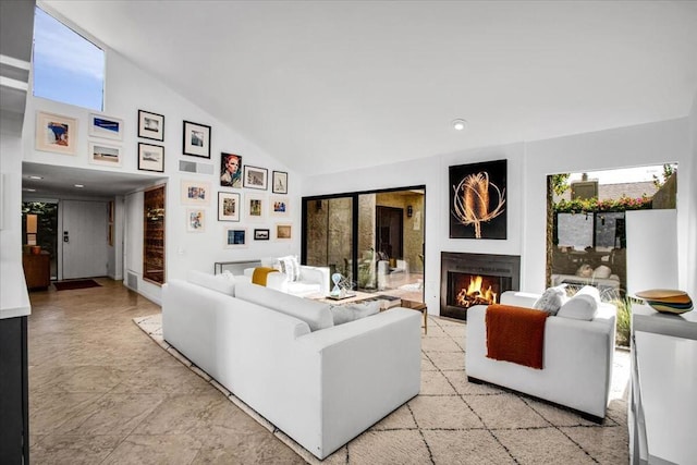 living room featuring lofted ceiling