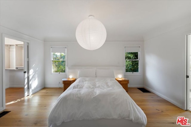 bedroom featuring light hardwood / wood-style floors