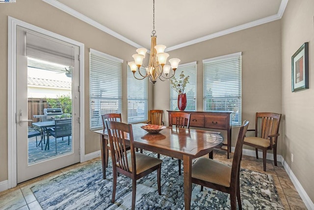 dining area with ceiling fan with notable chandelier, light tile patterned flooring, crown molding, and plenty of natural light