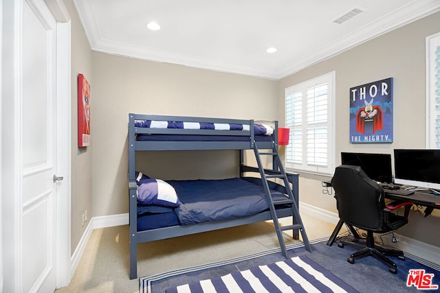 bedroom with carpet and ornamental molding