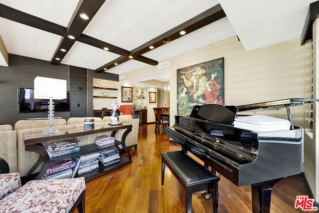 misc room with beamed ceiling, coffered ceiling, and hardwood / wood-style flooring