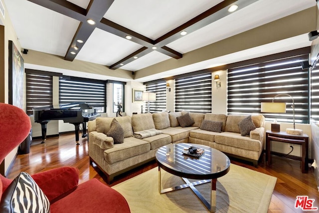 living room with beam ceiling, wood-type flooring, and coffered ceiling