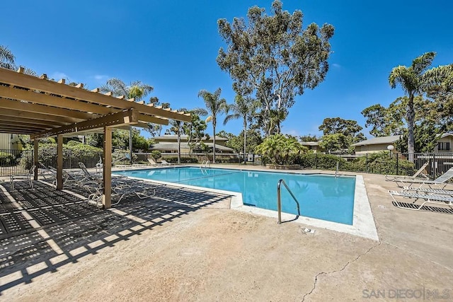 view of swimming pool featuring a patio area