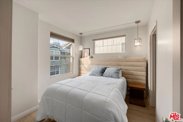 bedroom featuring light hardwood / wood-style floors