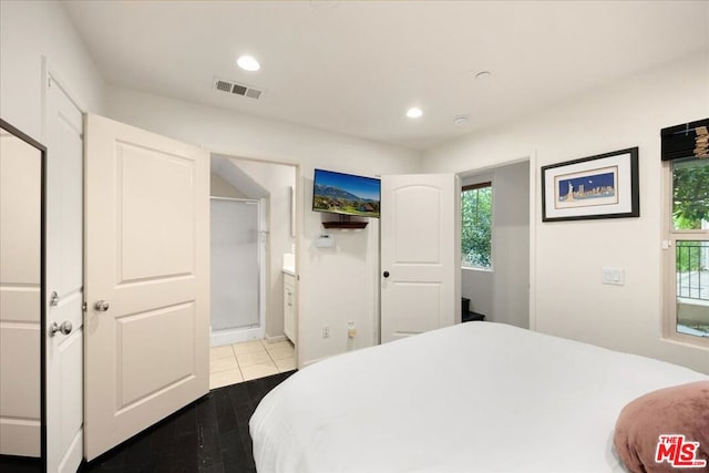 bedroom with tile patterned flooring