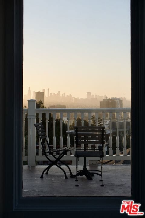 view of balcony at dusk