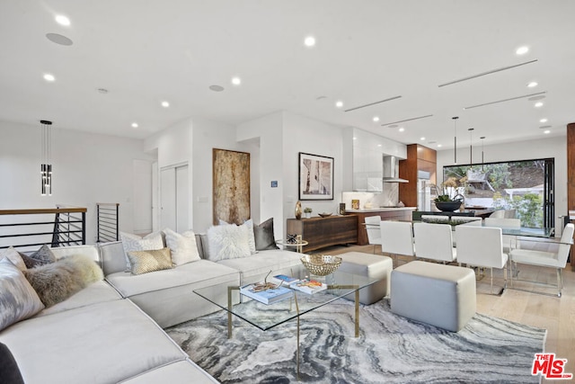 living room with light hardwood / wood-style floors