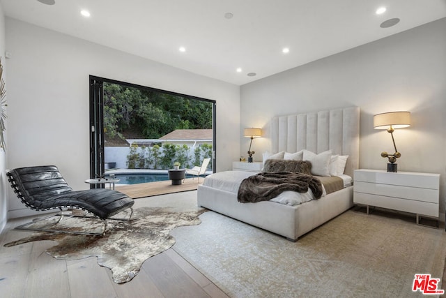 bedroom featuring light hardwood / wood-style flooring