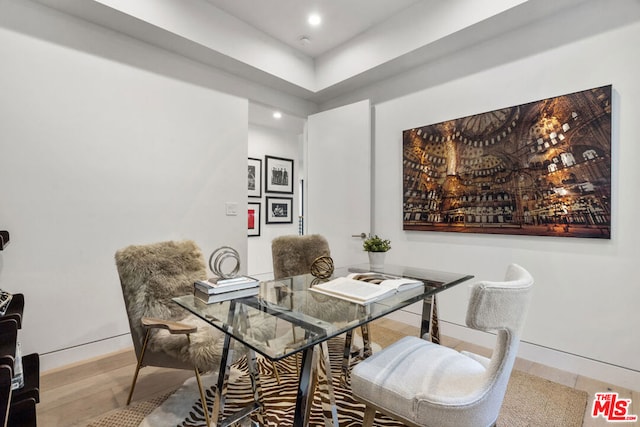 dining room with light hardwood / wood-style flooring