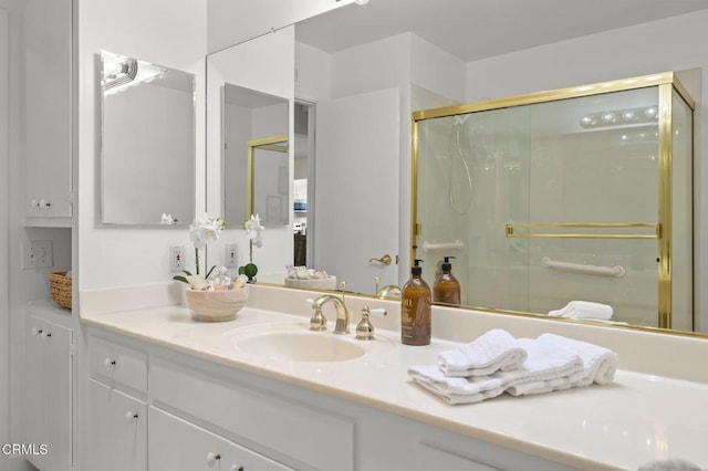 bathroom with vanity and walk in shower