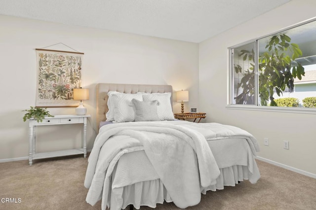 bedroom featuring light colored carpet