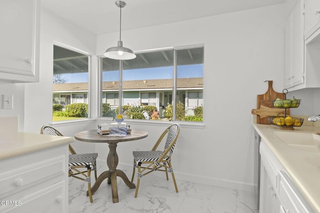 dining space with sink