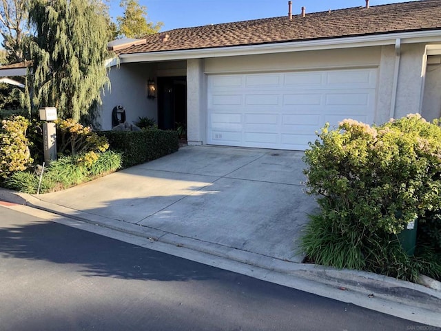 ranch-style home with a garage