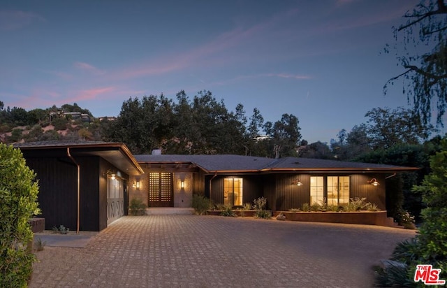 view of front of property featuring a garage