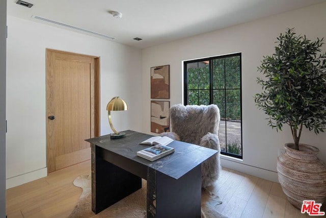 office area featuring light hardwood / wood-style flooring