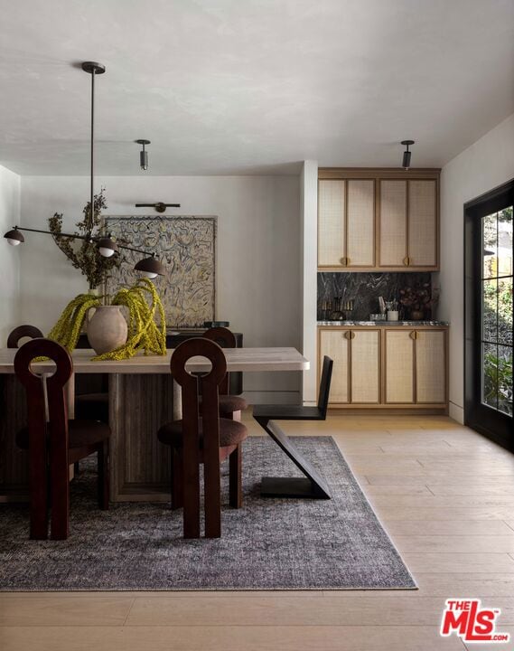 dining space featuring light hardwood / wood-style flooring