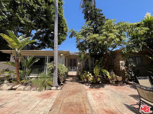 exterior space with a patio