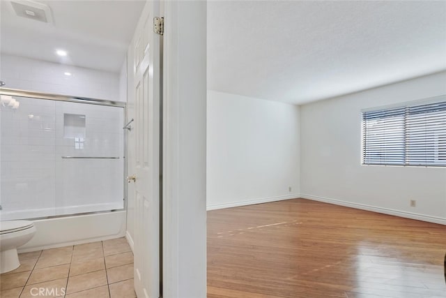 29121 Thousand Oaks Blvd Unit C, Agoura Hills, CA 91301 - full bathroom with bath / shower combo with glass door, wood finished floors, and recessed lighting