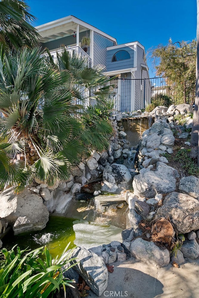 29121 Thousand Oaks Blvd Unit C, Agoura Hills, CA 91301 - view of home's exterior with a small pond