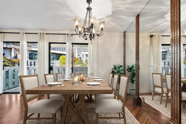 29121 Thousand Oaks Blvd Unit C, Agoura Hills, CA 91301 - dining room with a chandelier and parquet flooring