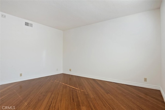 29121 Thousand Oaks Blvd Unit C, Agoura Hills, CA 91301 - spare room featuring baseboards and dark wood-style flooring