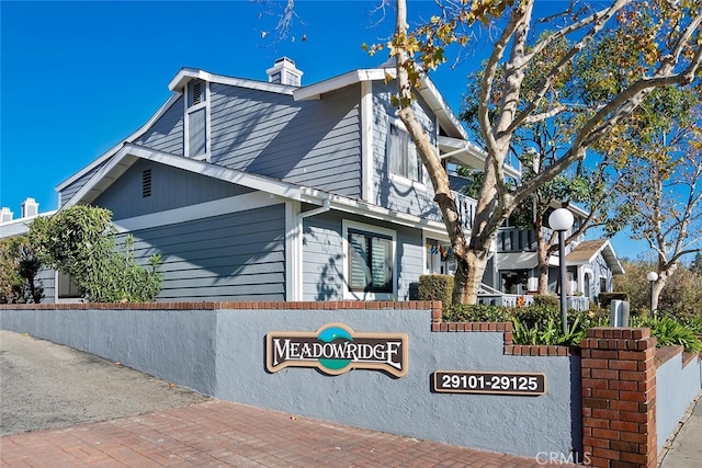 29121 Thousand Oaks Blvd Unit C, Agoura Hills, CA 91301 - view of home's exterior featuring a chimney