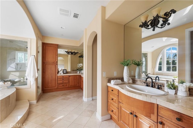 bathroom featuring tile patterned floors and vanity