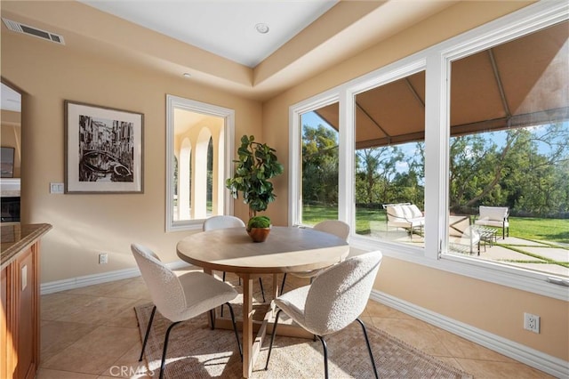 view of tiled dining space