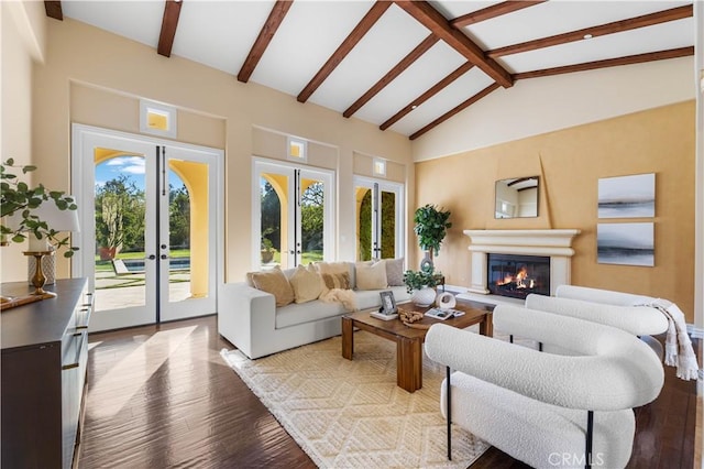 living room featuring french doors, beamed ceiling, high vaulted ceiling, and light wood-type flooring