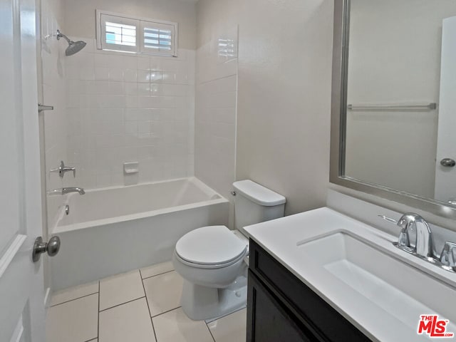 full bathroom featuring vanity,  shower combination, tile patterned floors, and toilet