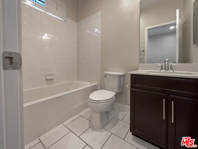 full bathroom with toilet, vanity, tile patterned floors, and bathing tub / shower combination