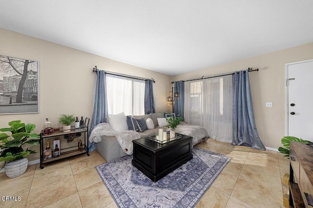 living room with light tile patterned floors