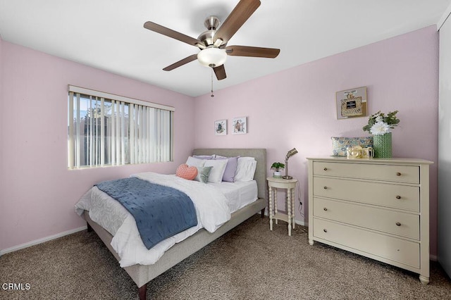 bedroom with baseboards, carpet flooring, and a ceiling fan