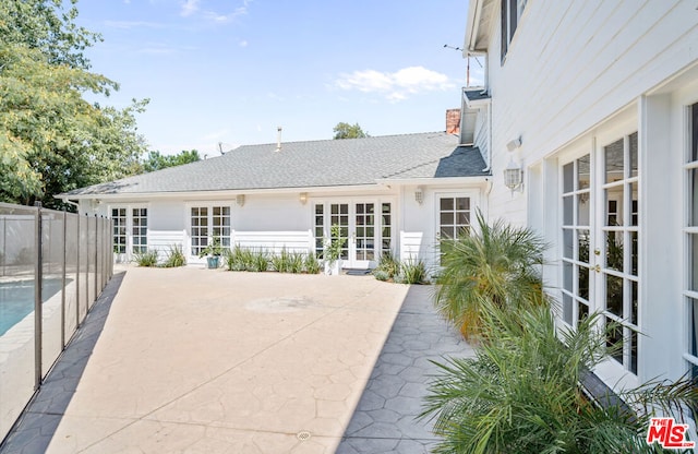 back of house featuring french doors and a patio area