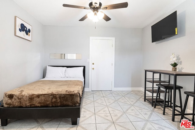 bedroom featuring ceiling fan